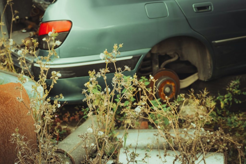 side view of an abandoned salvage vehicle