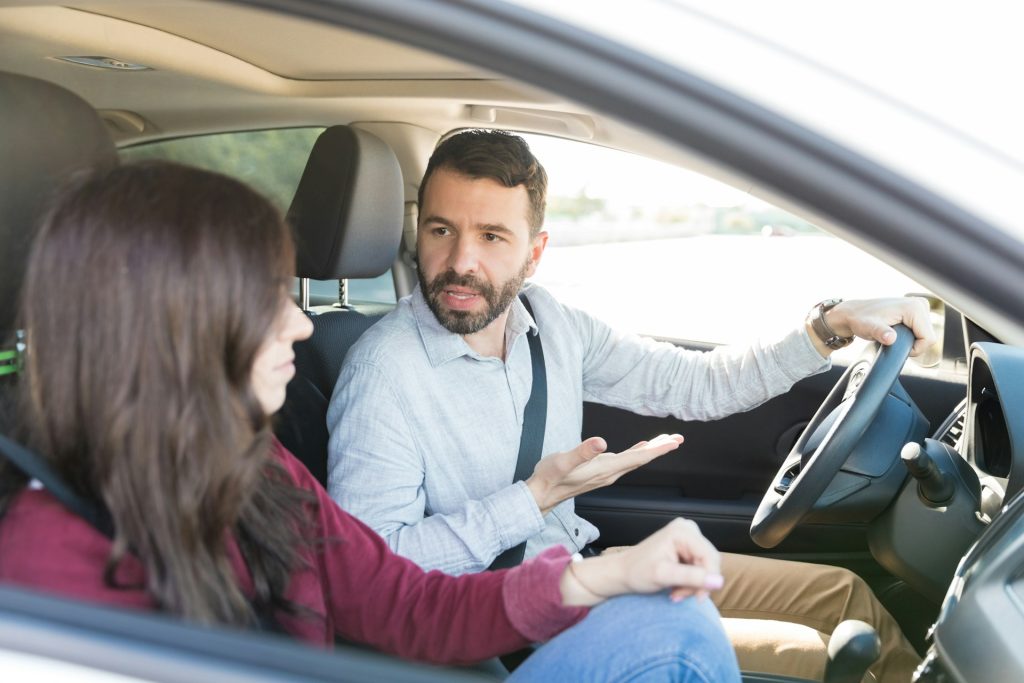 buyer and seller discussing car auction history