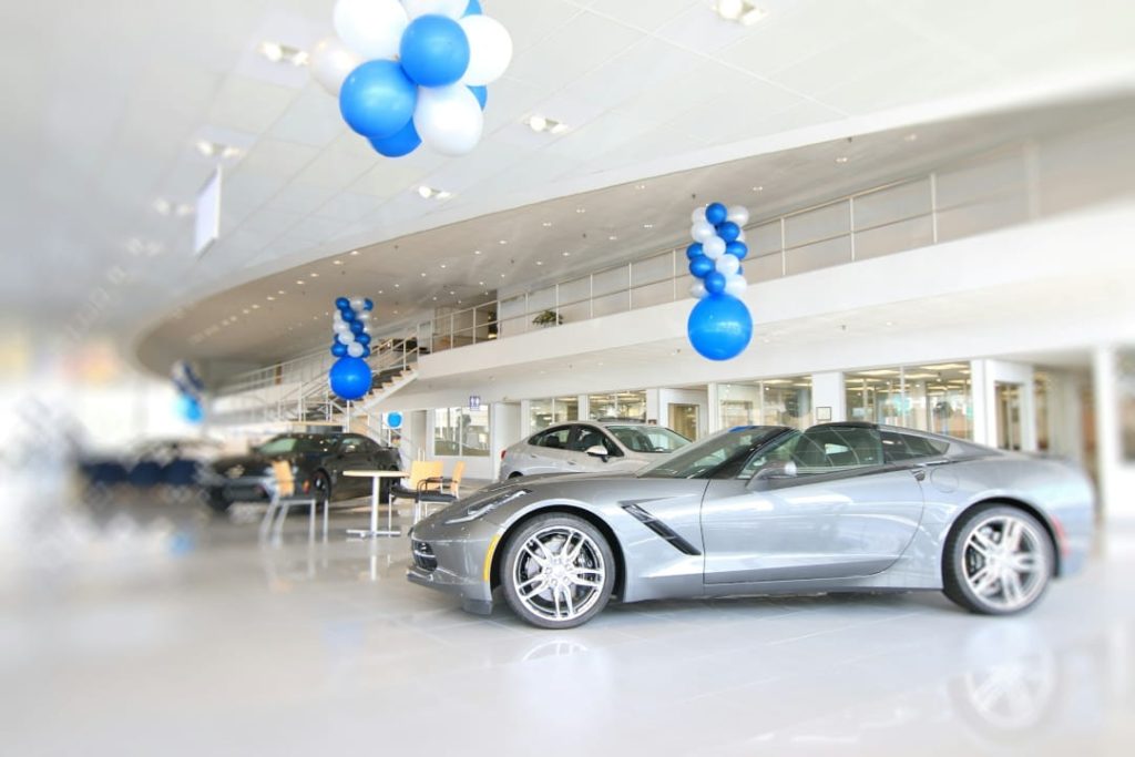 modern car dealership showroom with new vehicles